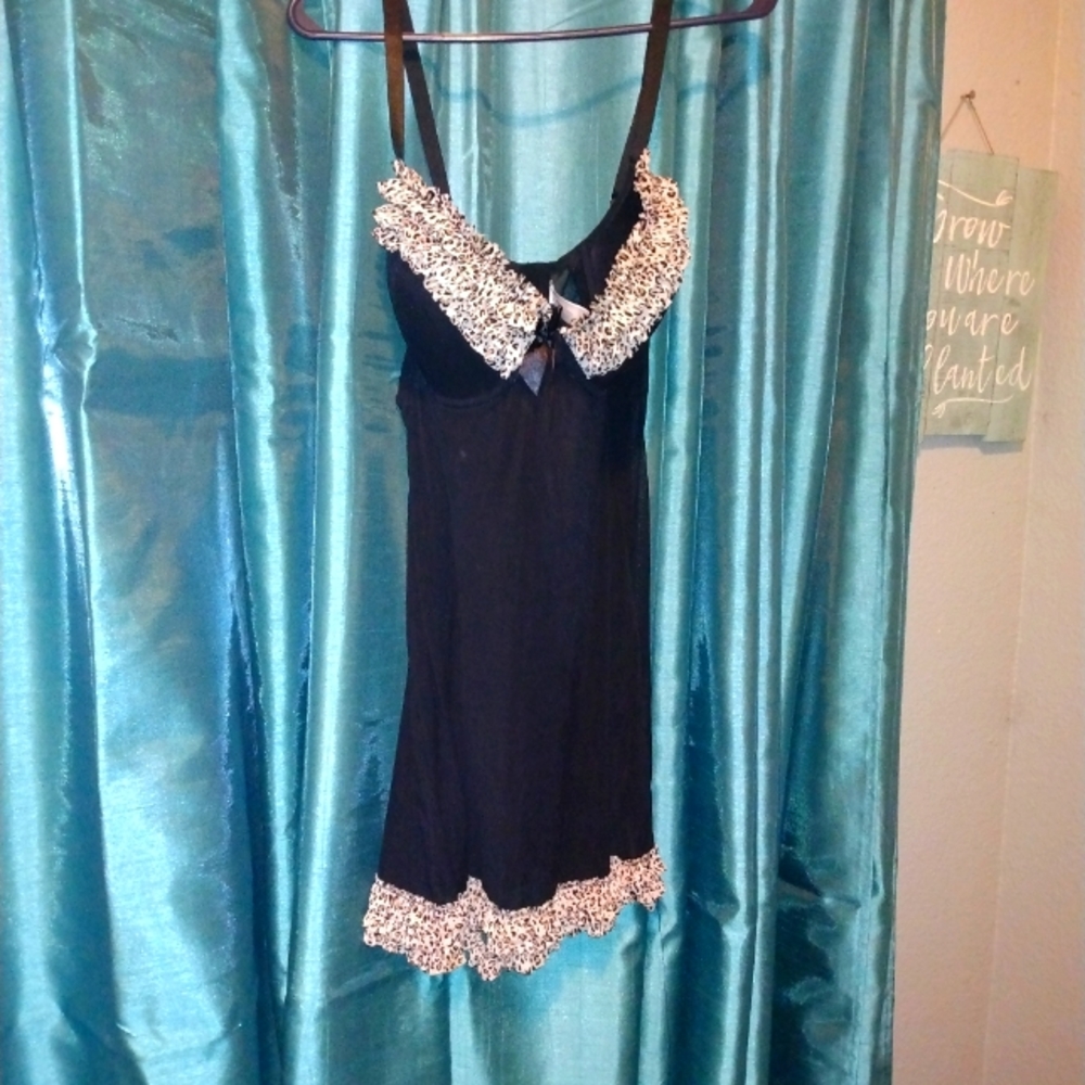 Black babydoll with cheetah print trim.